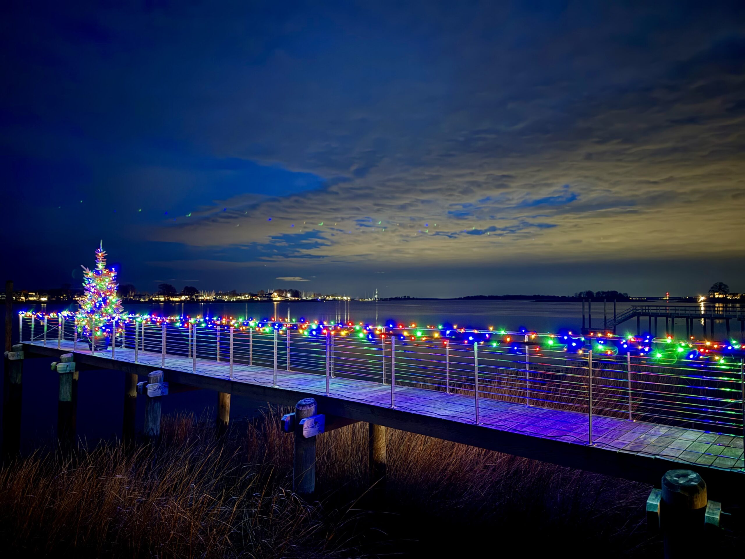 Winner of the Winter 2025-2026 Show us your SoNo Photo Contest - Kathy Olsen Holiday cheer on the Norwalk River at sunset # 3005